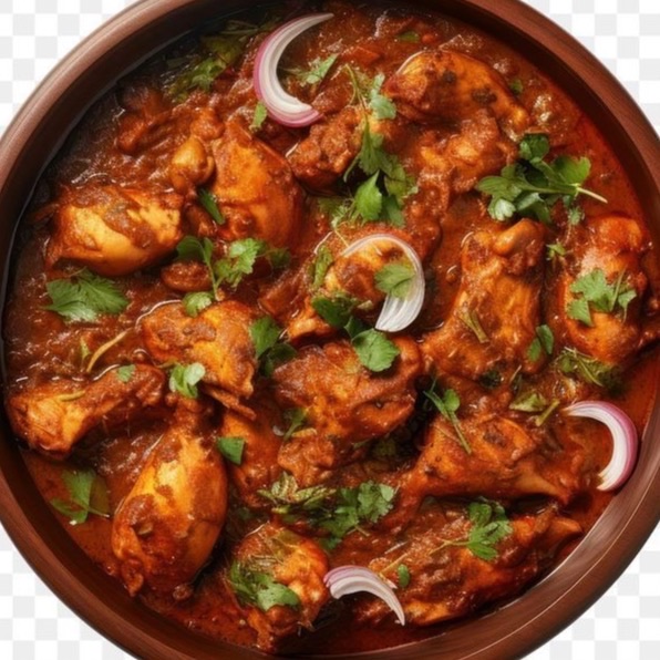 Chicken curry with coriander and red onion in a clay bowl